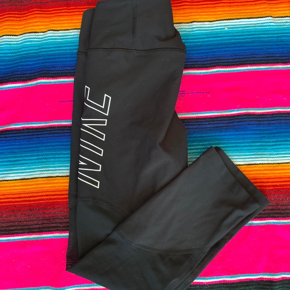 Nike black leggings with mesh detail